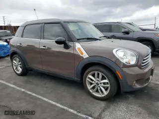 2013 MINI Cooper Countryman with VIN WMWZB3C54DWM09404, listed as a Copart auction lot 54568195 with 126,772 mi miles and Clean Title. Bid and sale history available at carsss.com. Image 4.
