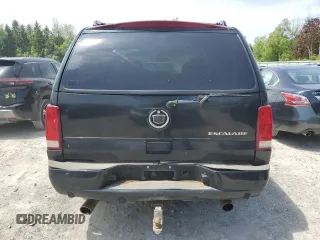 2004 Cadillac Escalade z VIN 1GYEK63N54R256740, wystawiony jako Copart lot #58633795 z przebiegiem 245 335 mil mil oraz Czysty tytuł • Clean title. Historia ofert i sprzedaży dostępna na DreamBid. Obrazek 6.