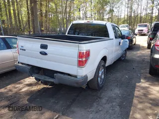 2014 Ford F-150 XL with VIN 1FTFX1CTXEFC01524, listed as a IAAI auction lot 41955270 with 251,992 mi miles. Bid and sale history available at carsss.com. Image 4.