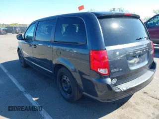 2014 Dodge Grand Caravan SE with VIN 2C4RDGBGXER254634, listed as a IAAI auction lot 42149494 with 158,614 mi miles and . Bid and sale history available at DreamBid. Image 3.