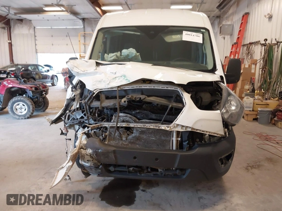 2020 Ford Transit Cargo with VIN 1FTBR1C82LKA59095, listed as a IAAI auction lot 40014706 with 116,057 mi miles and . Bid and sale history available at DreamBid. Image 12.