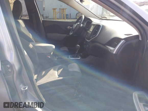 2014 Jeep Cherokee Altitude with VIN 1C4PJMCB5EW167961, listed as a IAAI auction lot 41660440 with 88,705 mi miles and . Bid and sale history available at DreamBid. Image 5.