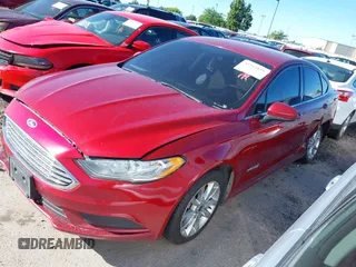 2017 Ford Fusion Hybrid SE with VIN 3FA6P0LU7HR317604, listed as a IAAI auction lot 42713039 with 302,322 mi miles and . Bid and sale history available at DreamBid. Image 16.