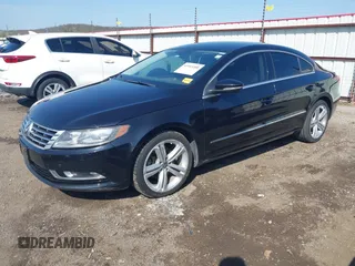 2013 Volkswagen CC Sport with VIN WVWBN7AN9DE518789, listed as a IAAI auction lot 41915400 with 114,847 mi miles. Bid and sale history available at carsss.com. Image 2.