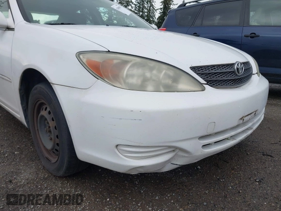 2004 Toyota Camry LE with VIN JTDBE32K840256161, listed as a IAAI auction lot 42000050 with 367,016 mi miles. Bid and sale history available at carsss.com. Image 6.