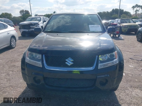2008 Suzuki Grand Vitara with VIN JS3TE941284102380, listed as a IAAI auction lot 42061609 with 103,554 mi miles and . Bid and sale history available at DreamBid. Image 12.