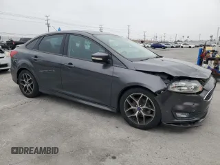 2016 Ford Focus SE z VIN 1FADP3F23GL405565, wystawiony jako Copart lot #60173935 z przebiegiem 82 167 mil mil oraz Szkoda całkowita • Salvage title. Historia ofert i sprzedaży dostępna na DreamBid. Obrazek 4.