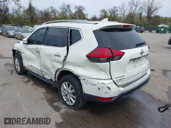 2017 Nissan Rogue S with VIN 5N1AT2MM3HC794051, listed as a IAAI auction lot 42063921 with 129,586 mi miles and . Bid and sale history available at DreamBid. Image 3.