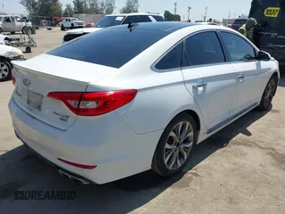 2015 Hyundai Sonata Sport with VIN 5NPE34ABXFH195251, listed as a IAAI auction lot 42002496 with 142,381 mi miles and . Bid and sale history available at carsss.com. Image 4.
