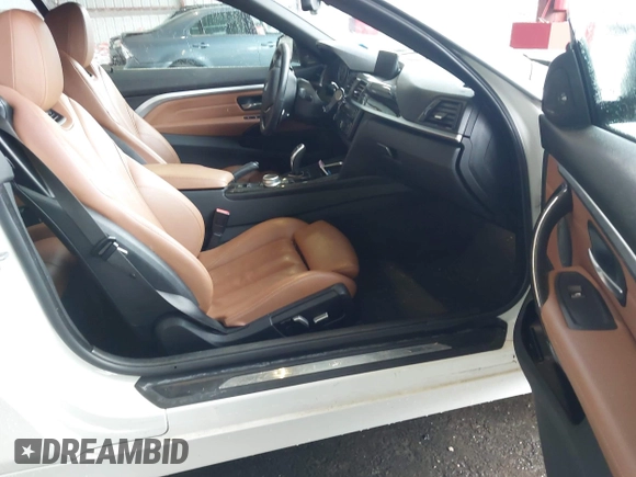 2017 BMW 4 Series 430i xDrive z VIN WBA4U9C30H5H64364, wystawiony jako IAAI lot #42502753 z przebiegiem 100 988 mil mil oraz . Historia ofert i sprzedaży dostępna na DreamBid. Obrazek 5.