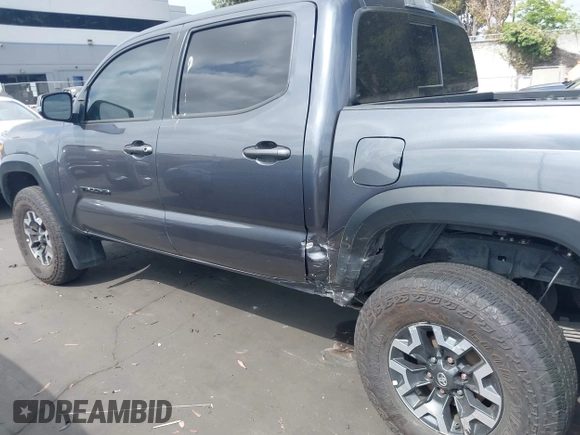 2023 Toyota Tacoma SR with VIN 3TMCZ5AN0PM635933, listed as a IAAI auction lot 42543126 with 32,960 mi miles and . Bid and sale history available at DreamBid. Image 15.