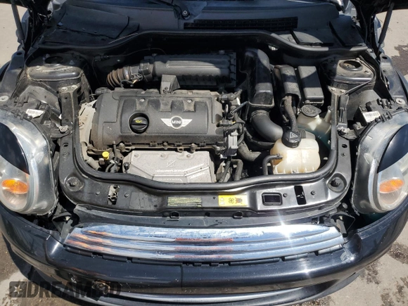 2012 MINI Hardtop with VIN WMWSU3C52CT369481, listed as a Copart auction lot 56030045 with 146,546 mi miles and Salvage title. Bid and sale history available at DreamBid. Image 11.