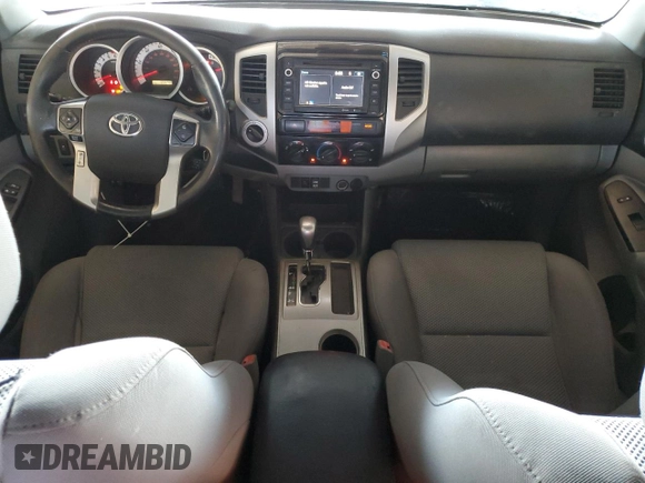 2015 Toyota Tacoma z VIN 3TMLU4EN9FM192716, wystawiony jako Copart lot #61462045 z przebiegiem 103 240 mil mil oraz Szkoda całkowita • Salvage title. Historia ofert i sprzedaży dostępna na DreamBid. Obrazek 8.