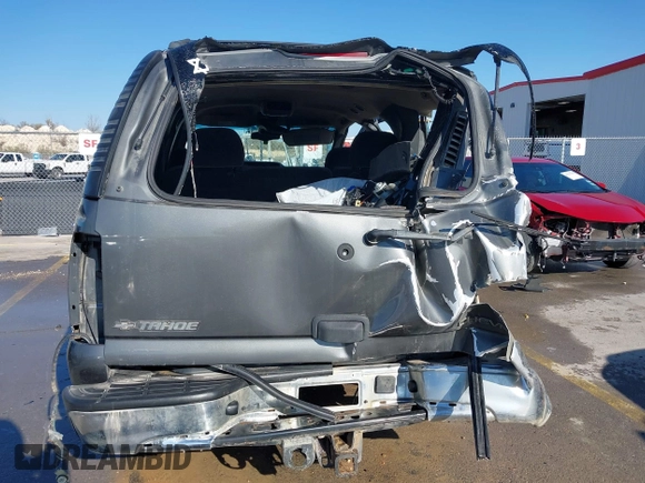 2002 Chevrolet Tahoe LT z VIN 1GNEC13Z42R319646, wystawiony jako IAAI lot #41623259 z przebiegiem 250 430 mil mil oraz . Historia ofert i sprzedaży dostępna na DreamBid. Obrazek 18.
