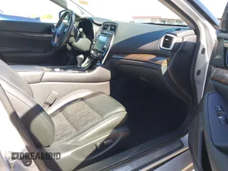 2016 Nissan Maxima SL z VIN 1N4AA6AP3GC377081, wystawiony jako IAAI lot #42235817 z przebiegiem 159 571 mil mil oraz . Historia ofert i sprzedaży dostępna na DreamBid. Obrazek 5.