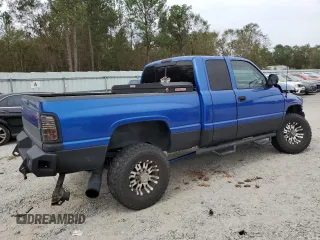 1999 Dodge Ram 2500 with VIN 1B7KF2363XJ504002, listed as a Copart auction lot 73557954 with 297,618 mi miles and Salvage Title. Bid and sale history available at carsss.com. Image 3.