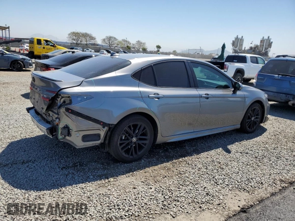 2025 Toyota Camry LE with VIN 4T1DAACK2SU517728, listed as a Copart auction lot 52567455 with 28,385 mi miles and Salvage Title. Bid and sale history available at DreamBid. Image 3.
