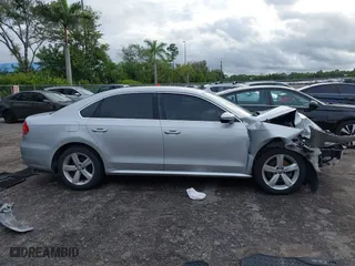 2012 Volkswagen Passat SE with VIN 1VWBP7A38CC074580, listed as a IAAI auction lot 40556967 with 158,525 mi miles. Bid and sale history available at carsss.com. Image 13.