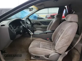 1996 Ford Thunderbird LX with VIN 1FALP62W8TH174603, listed as a Copart auction lot 72928574 with 153,614 mi miles and Salvage Title. Bid and sale history available at DreamBid. Image 7.