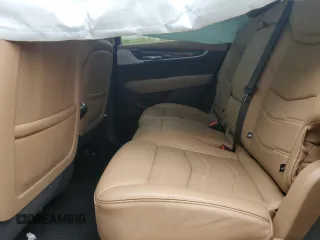 2021 Cadillac XT6 AWD Sport z VIN 1GYKPHRS9MZ165189, wystawiony jako Copart lot #58482665 z przebiegiem Nie podano mil oraz Szkoda całkowita • Salvage title. Historia ofert i sprzedaży dostępna na DreamBid. Obrazek 10.