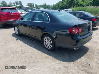 2010 Volkswagen Jetta SE z VIN 3VWRZ7AJ9AM042787, wystawiony jako IAAI lot #42466773 z przebiegiem 144 829 mil mil oraz . Historia ofert i sprzedaży dostępna na DreamBid. Obrazek 3.