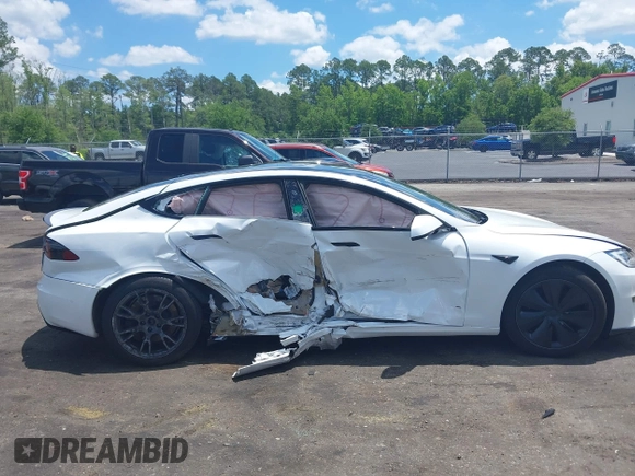 2021 Tesla Model S Plaid с VIN 5YJSA1E62MF438406, выставлен на аукционе IAAI как лот 42246901 с пробегом Не указан миль и . История ставок и продаж доступна на DreamBid. Изображение 13.