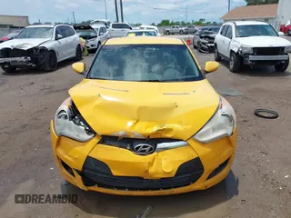 2012 Hyundai Veloster w/Black Int with VIN KMHTC6AD5CU046702, listed as a IAAI auction lot 42245379 with 136,327 mi miles and . Bid and sale history available at DreamBid. Image 12.