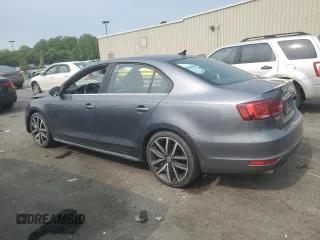 2014 Volkswagen Jetta GLI with VIN 3VW4T7AJ3EM352712, listed as a Copart auction lot 59582825 with 145,765 mi miles and Salvage title. Bid and sale history available at DreamBid. Image 2.