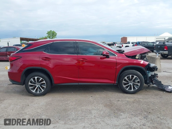 2022 Lexus RX 350 with VIN 2T2HZMAA0NC256932, listed as a IAAI auction lot 42179918 with 24,790 mi miles and . Bid and sale history available at DreamBid. Image 13.