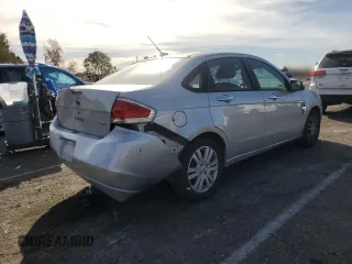 2009 Ford Focus SEL with VIN 1FAHP37N39W232674, listed as a Copart auction lot 42154695 with 127,764 mi miles and Salvage Title. Bid and sale history available at carsss.com. Image 3.