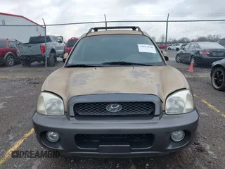 2004 Hyundai Santa Fe GLS with VIN KM8SC13E74U685895, listed as a IAAI auction lot 41813226 with 195,217 mi miles. Bid and sale history available at carsss.com. Image 6.