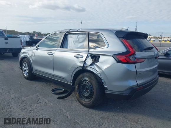 2024 Honda CR-V LX with VIN 2HKRS3H21RH308688, listed as a IAAI auction lot 41350785 with 19,835 mi miles and . Bid and sale history available at DreamBid. Image 3.