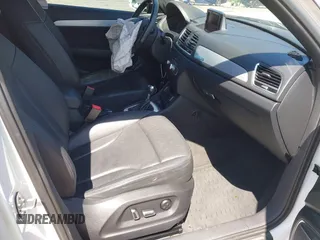 2018 Audi Q3 Premium Plus z VIN WA1JCCFS3JR028436, wystawiony jako IAAI lot #42067256 z przebiegiem 63 722 mil mil oraz . Historia ofert i sprzedaży dostępna na DreamBid. Obrazek 5.