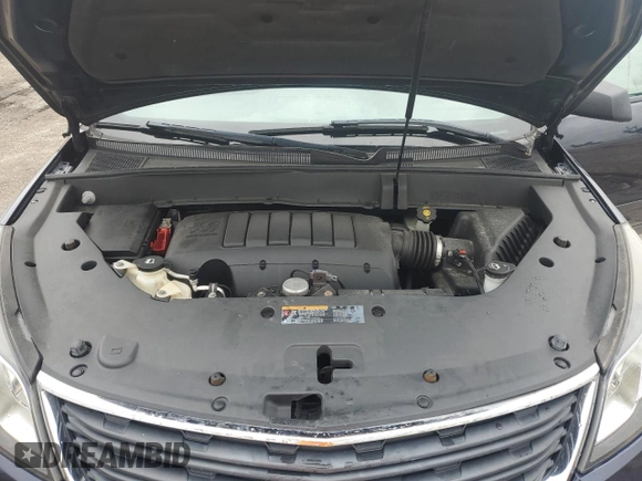 2015 Chevrolet Traverse LS z VIN 1GNKRFED6FJ113457, wystawiony jako Copart lot #74671954 z przebiegiem Nie podano mil oraz Szkoda całkowita • Salvage title. Historia ofert i sprzedaży dostępna na DreamBid. Obrazek 12.