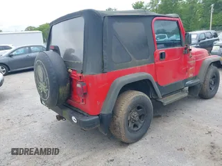 1999 Jeep Wrangler Sport z VIN 1J4FY19S0XP482218, wystawiony jako IAAI lot #42374995 z przebiegiem 149 216 mil mil oraz . Historia ofert i sprzedaży dostępna na DreamBid. Obrazek 4.