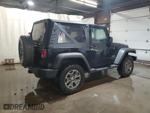 2014 Jeep Wrangler Sport with VIN 1C4AJWAG5EL307945, listed as a Copart auction lot 60152035 with 119,508 mi miles and Salvage title. Bid and sale history available at DreamBid. Image 3.