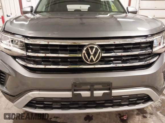 2021 Volkswagen Atlas SE z VIN 1V2KR2CA5MC606590, wystawiony jako IAAI lot #42383813 z przebiegiem 45 087 mil mil oraz . Historia ofert i sprzedaży dostępna na DreamBid. Obrazek 19.