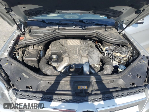 2013 Mercedes-Benz GL 450 z VIN 4JGDF7CE7DA216651, wystawiony jako Copart lot #53931335 z przebiegiem 141 167 mil mil oraz Szkoda całkowita • Salvage title. Historia ofert i sprzedaży dostępna na DreamBid. Obrazek 12.