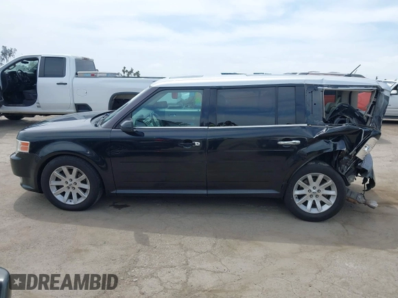 2011 Ford Flex SEL z VIN 2FMGK5CC9BBD24203, wystawiony jako IAAI lot #42246936 z przebiegiem 168 500 mil mil oraz . Historia ofert i sprzedaży dostępna na DreamBid. Obrazek 15.