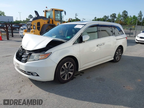 2014 Honda Odyssey Touring with VIN 5FNRL5H94EB001479, listed as a IAAI auction lot 41123678 with 147,269 mi miles and . Bid and sale history available at carsss.com. Image 19.
