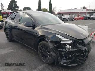 2023 Tesla Model Y Long Range with VIN 7SAYGDEE2PA024032, listed as a IAAI auction lot 41213403 with 23,418 mi miles and . Bid and sale history available at DreamBid. Image 13.