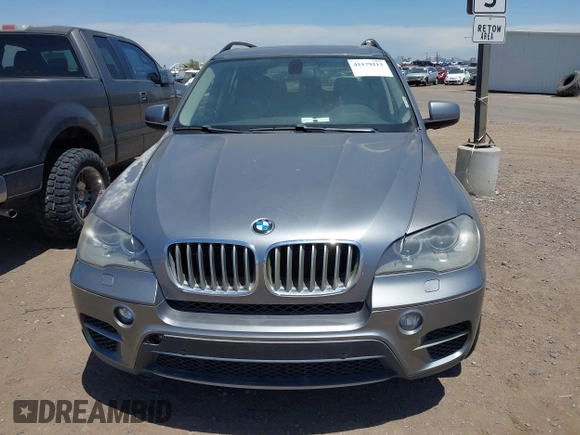 2013 BMW X5 xDrive50i with VIN 5UXZV8C56D0C15064, listed as a IAAI auction lot 42179213 with Not provided miles and . Bid and sale history available at DreamBid. Image 6.