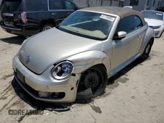 2014 Volkswagen Beetle 1.8T z VIN 3VW517AT9EM820812, wystawiony jako Copart lot #61730685 z przebiegiem 85 571 mil mil oraz Czysty tytuł • Clean title. Historia ofert i sprzedaży dostępna na DreamBid. Obrazek 1.