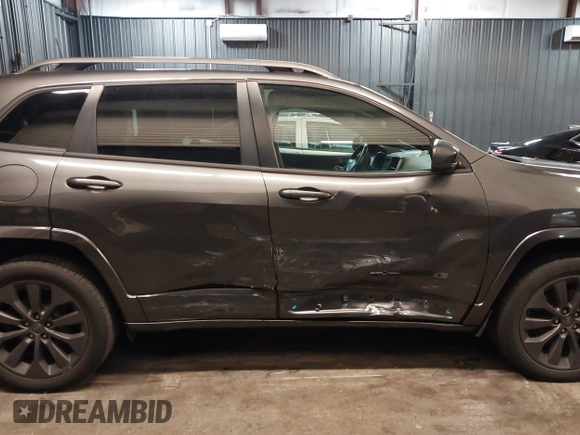 2019 Jeep Cherokee Limited with VIN 1C4PJMDXXKD354324, listed as a IAAI auction lot 41834774 with 55,107 mi miles and . Bid and sale history available at DreamBid. Image 13.