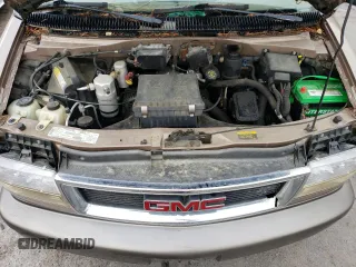 1999 GMC Safari with VIN 1GKEL19W4XB506220, listed as a Copart auction lot 77257424 with 151,966 mi miles and Clean Title. Bid and sale history available at carsss.com. Image 12.