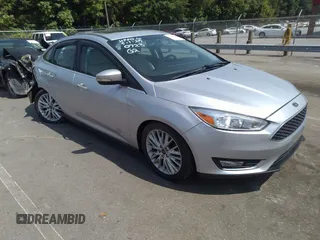2018 Ford Focus Titanium with VIN 1FADP3J26JL280723, listed as a IAAI auction lot 42319900 with 149,583 mi miles and . Bid and sale history available at DreamBid. Image 1.