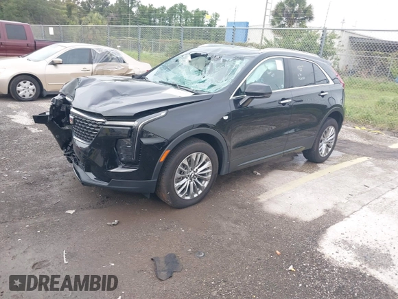 2024 Cadillac XT4 AWD Premium Luxury с VIN 1GYFZDR44RF147956, выставлен на аукционе IAAI как лот 42434595 с пробегом 26 328 миль миль и . История ставок и продаж доступна на DreamBid. Изображение 2.