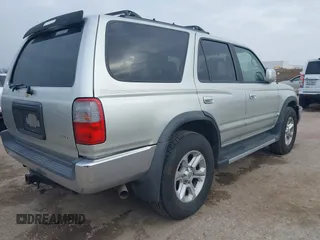 1999 Toyota 4Runner SR5 z VIN JT3GN86R1X0123115, wystawiony jako IAAI lot #41505478 z przebiegiem 173 141 mil mil oraz . Historia ofert i sprzedaży dostępna na DreamBid. Obrazek 4.
