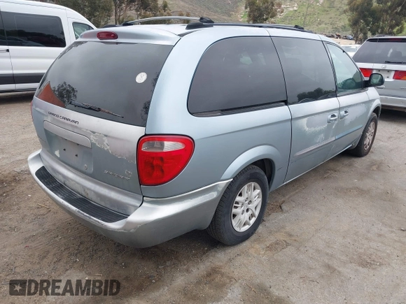2003 Dodge Grand Caravan with VIN 1D4GP44383B252581, listed as a IAAI auction lot 41838754 with 164,773 mi miles and . Bid and sale history available at DreamBid. Image 4.