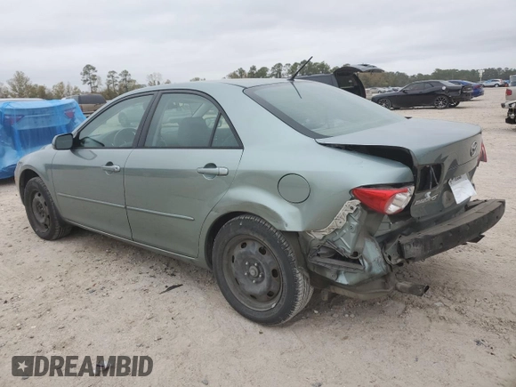 2004 Mazda 6 i with VIN 1YVFP80C045N21964, listed as a Copart auction lot 85071874 with 229,049 mi miles and Salvage Title. Bid and sale history available at DreamBid. Image 2.